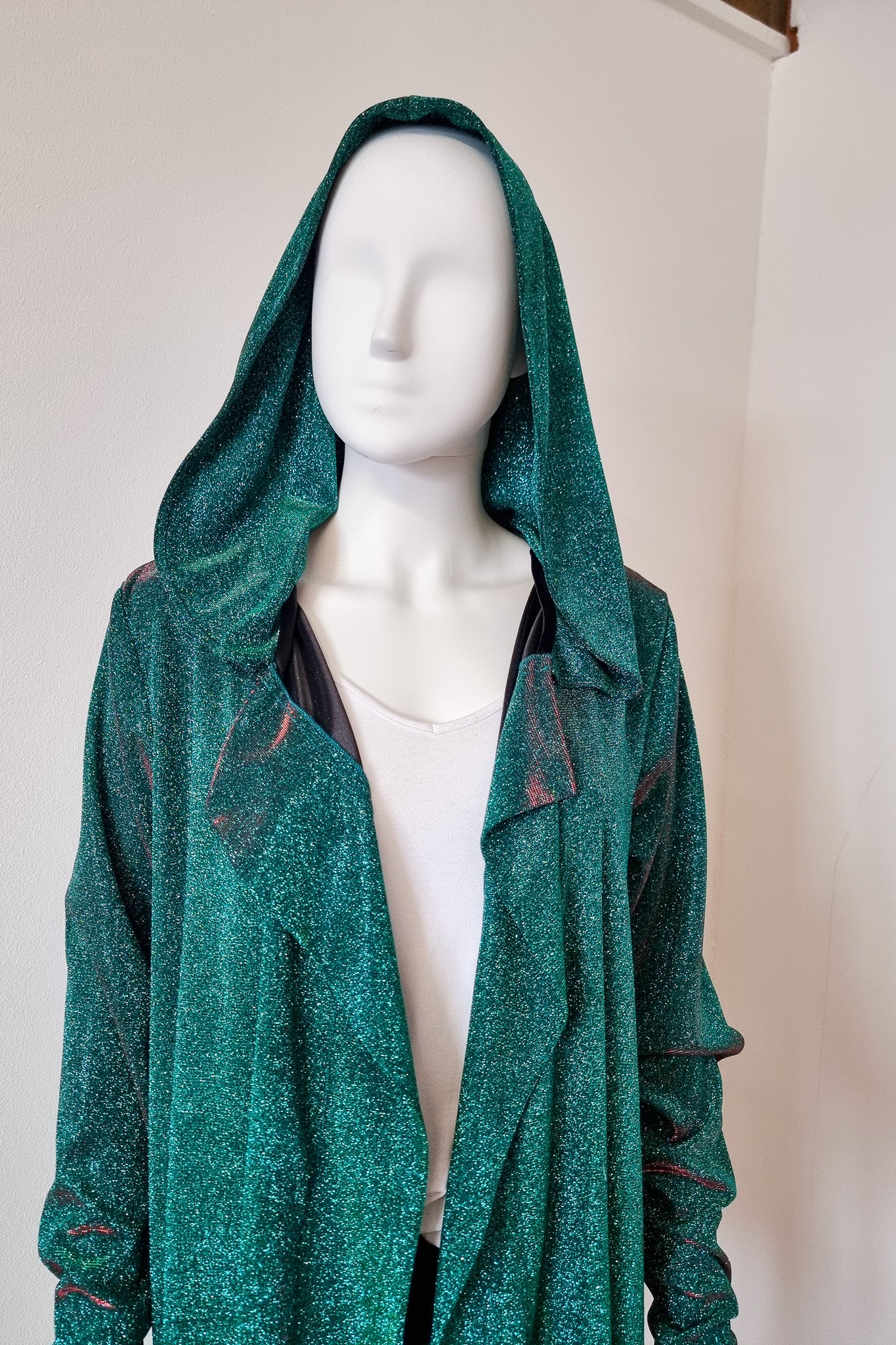 Detailed shot of the Miho cardigan, hood up