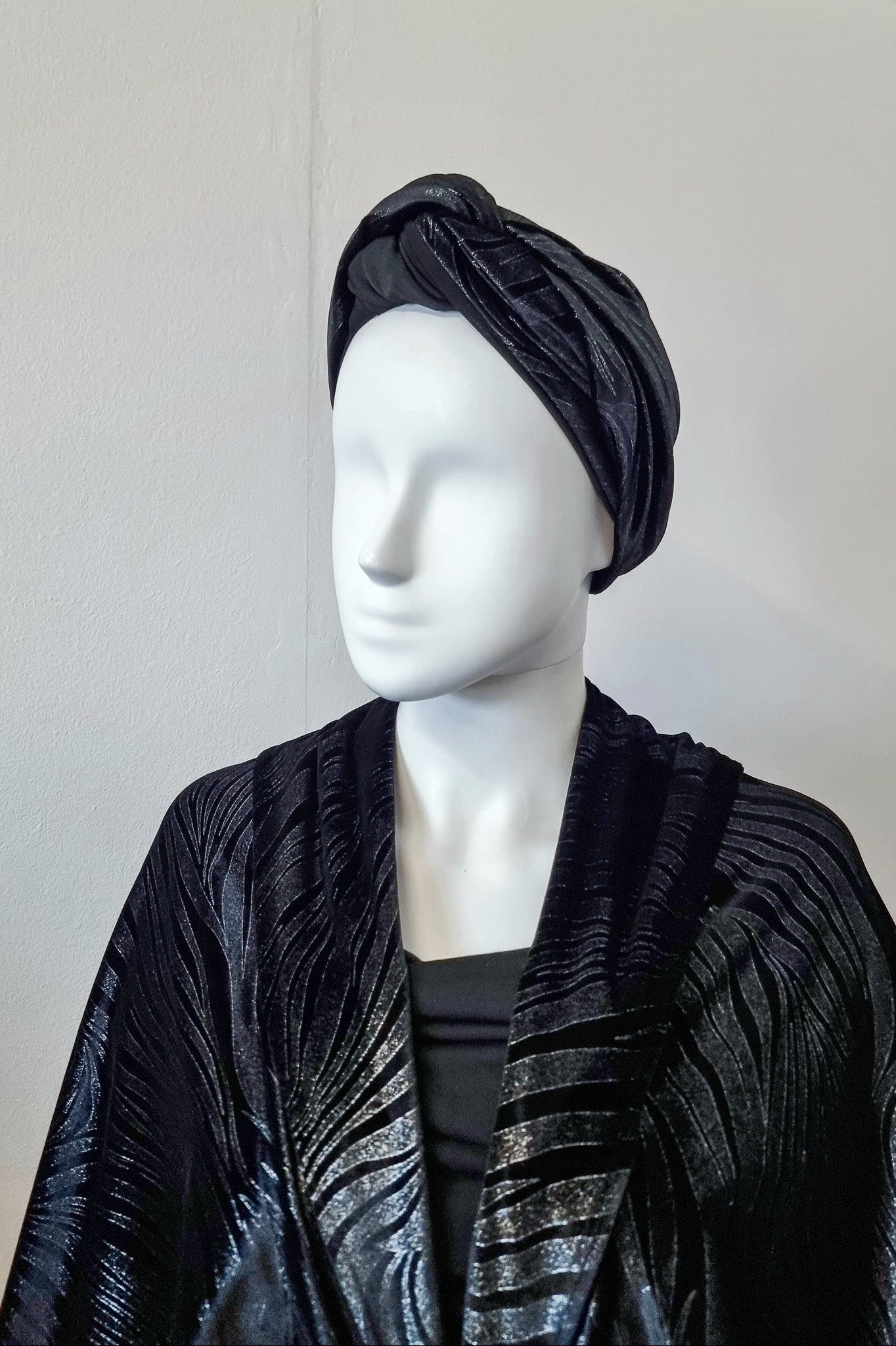 Riri worn in a smoother traditional turban style