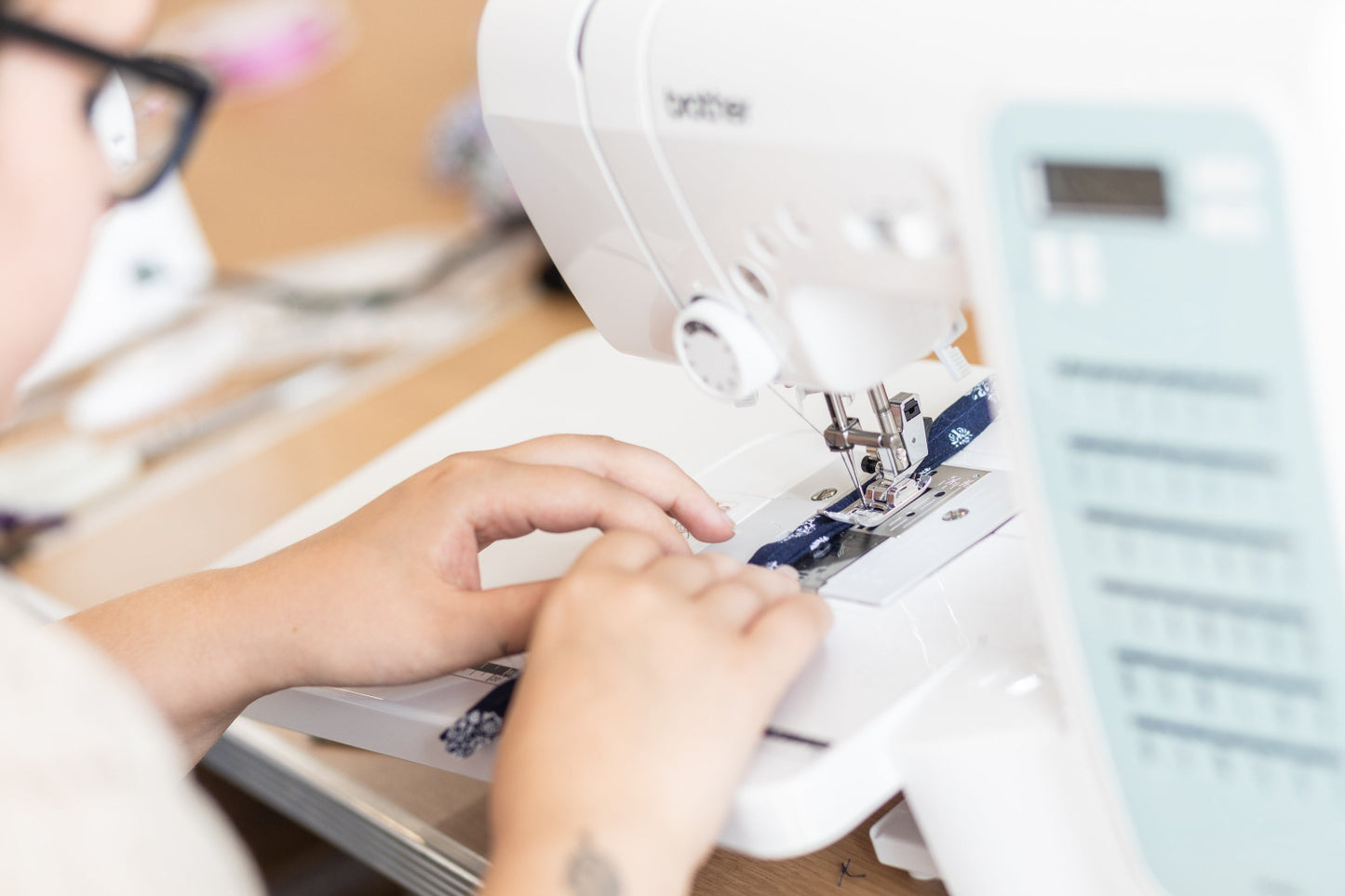 Detailed shot of a student on a domestic machine